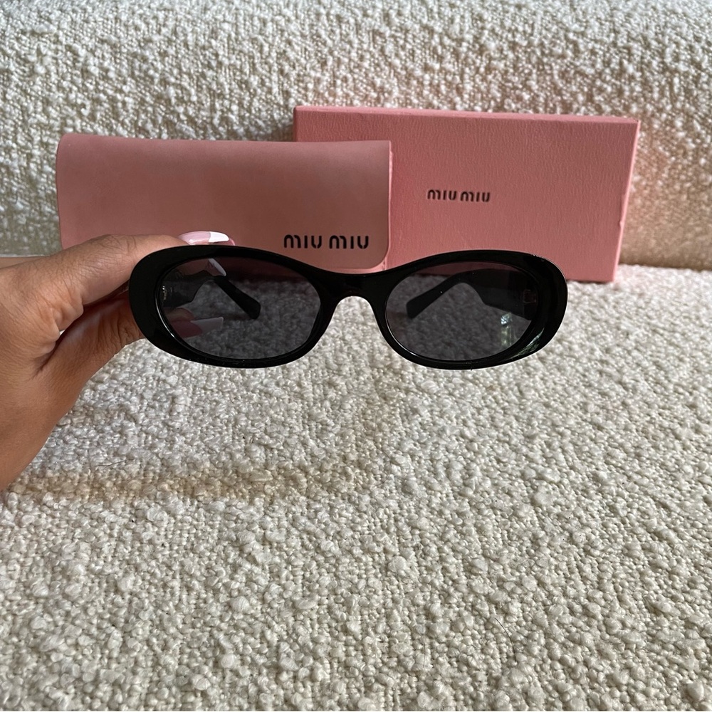 Miu Miu Black Oval Sunglasses